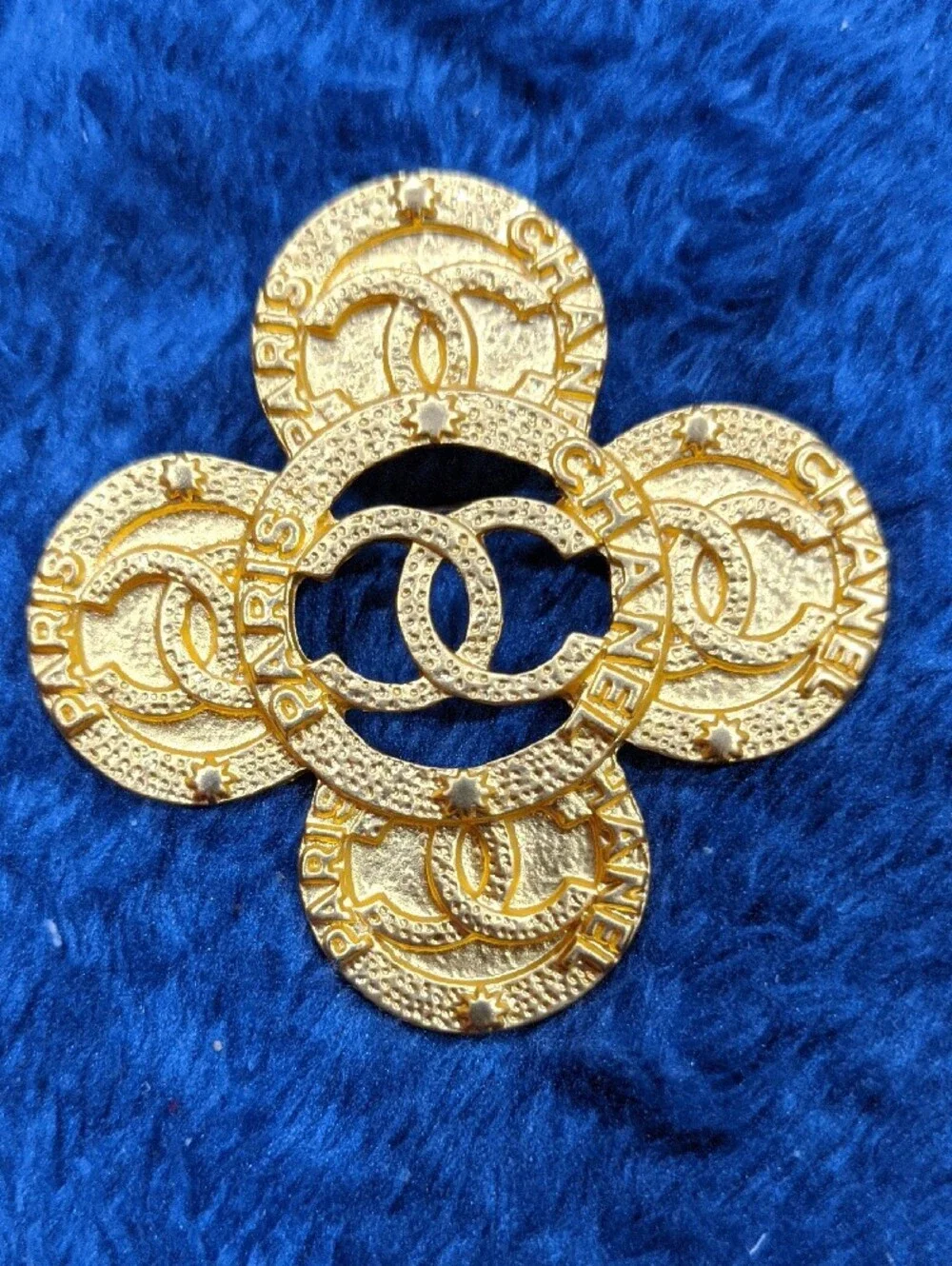 Modern Lux Gold Floral Coin Logo Brooch - Not Chanel